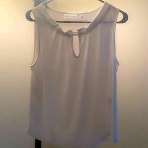 White sleeveless blouse